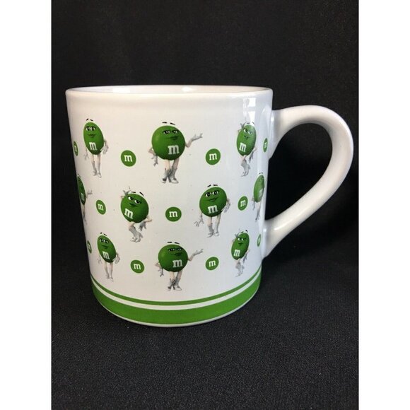 Green M&M Many Faces 16oz Ceramic White Coffee Tea Mug Cup Mars 2018 Sexy Lady - Picture 1 of 6